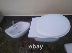 Semi recessed sink and back to the wall toilet pan vanity ensuite bathroom
