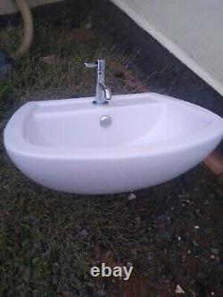 Semi recessed sink and back to the wall toilet pan vanity ensuite bathroom