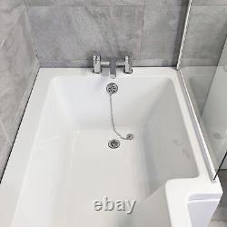 Ensemble de baignoire-douche en forme de L de 1700, comprenant robinets, toilettes compactes et meuble-lavabo à main droite.