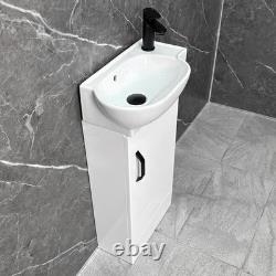 Ensemble de salle de bains, meuble sous-vasque blanc, poignée noire et dos ouvert pour toilettes