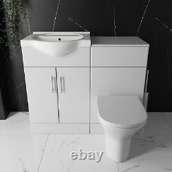 Meuble de salle de bain avec lavabo de 1050 mm, réservoir de toilette dos au mur, robinet et évacuation.