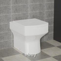 Meuble de salle de bain en forme de L, gris brillant, avec lavabo encastré et toilettes BTW, côté droit.