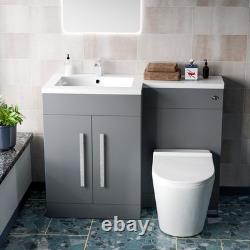 Unité de meuble lavabo Nes Home 1100mm LH en gris mat et toilettes sans bride à poser contre le mur.