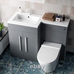 Unité de meuble lavabo Nes Home 1100mm LH en gris mat et toilettes sans bride à poser contre le mur.