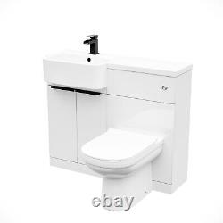 Unité de vanité de bassin avec poignée noire et lavabo blanc avec unité de WC et toilettes.